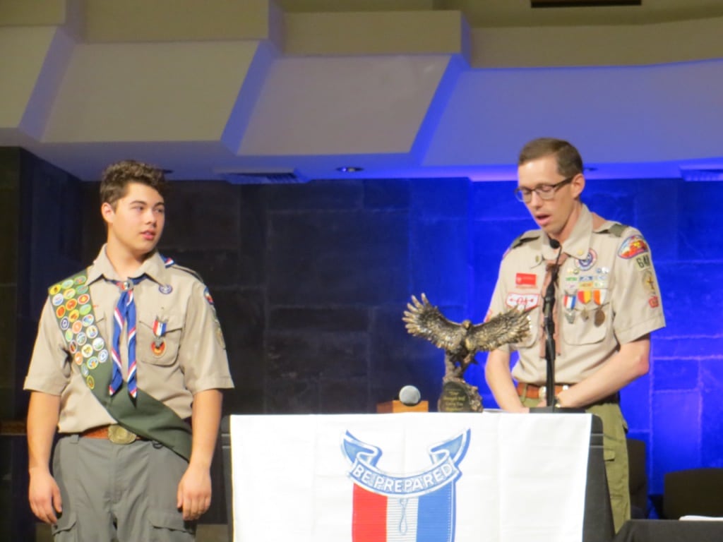 Jacob Benyi at podium presenting for Boy Scouts of America