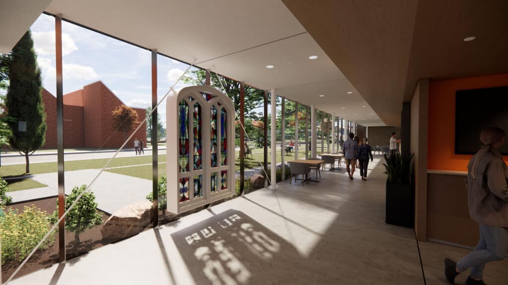 sunlight entering into Center of Life space through historic stained glass window