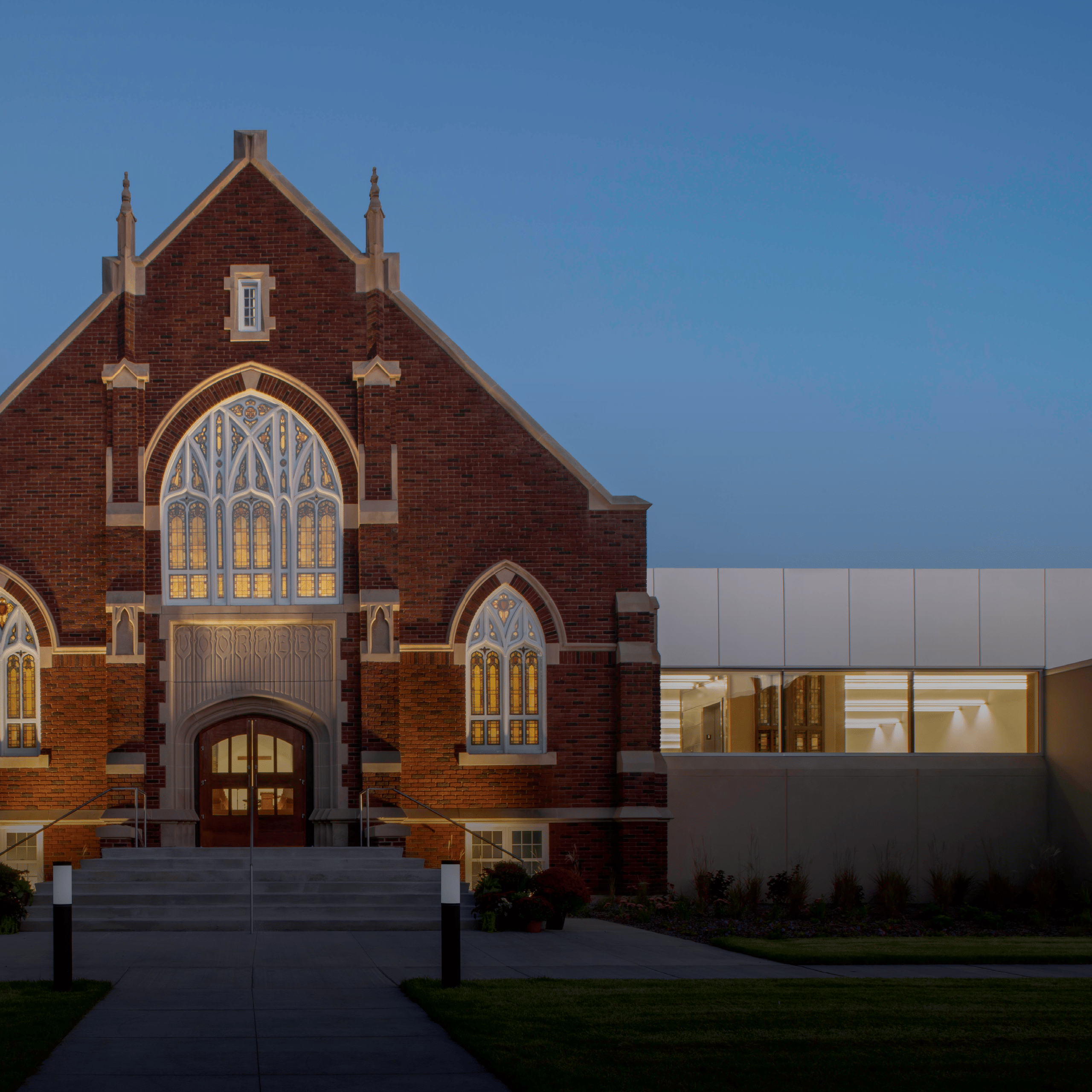 Renovated Voorhees Chapel and contemporary connector to the Center for Faith and Life at the University of Jamestown, designed by Jones Studio to create open, connected spaces for campus life.