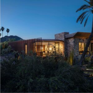Lights on inside Camelback Casita with Camelback Mountain in background