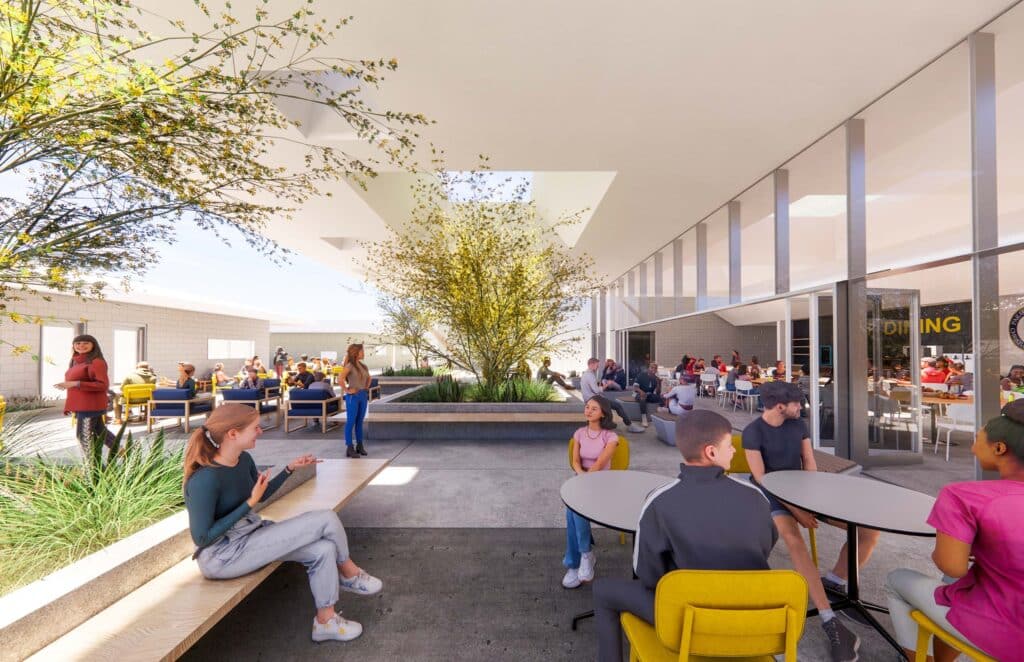 Rendering of people sitting under outdoor awning in master plan for PVCP renovation